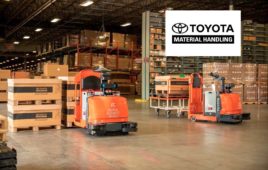 Toyota Material Handling logo with two automated fork trucks in a warehouse