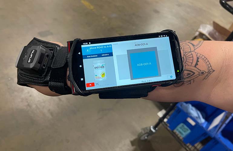 worker arm with mounted wireless smartphone