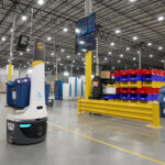 a locus robot moves through a UPS warehouse