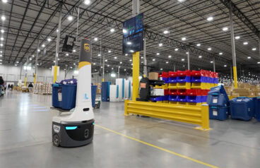 a locus robot moves through a UPS warehouse