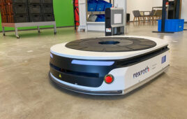 a rexroth mobile robot without a payload moves across the floor.