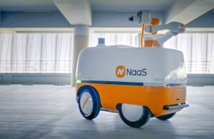 Naas mobile robot in a parking lot.