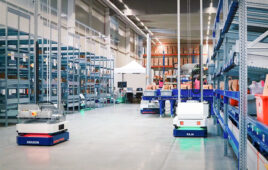 two autopicker mobile robots from brightpick move items in a warehouse.