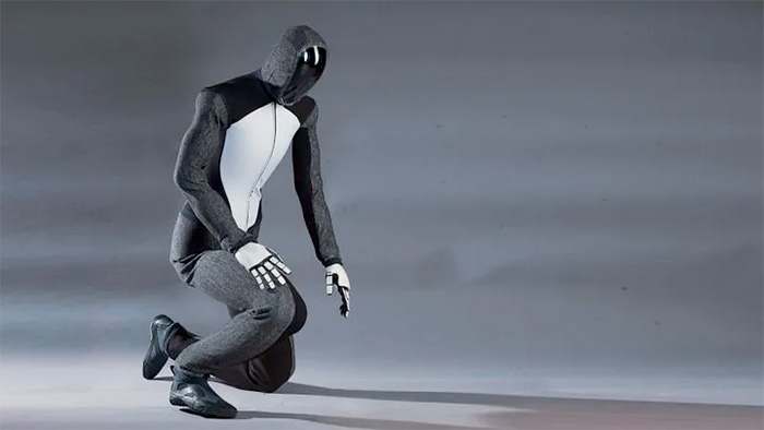 1X Neo humanoid robot model appears to kneel on the ground.