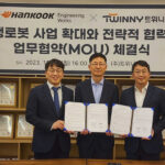 Twinny Co-CEOs Cheon Hong-seok and Cheon Young-seok, along with Hankook Engineering Works CEO Moon Dong-hwan, commemorate the signing of a business agreement at Twinny's Daejeon headquarters on the 13th, as they advance efforts to expand the autonomous robot development business.